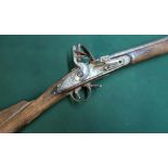 British flintlock carbine with 27" barrel the lock engraved with crown and tower , with brass mounts