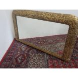 Small Victorian over mantle mirror in gilt relief molded frame on ball supports, W81cm, H46cm
