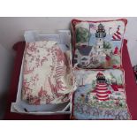 Pair of needlework cushions depicting lighthouses and a 20th C Durham quilt