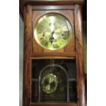Late 20th C German wall in clock simulated rosewood case, single glazed leaded panel door