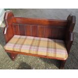 Small Victorian pitch pine pew, panel back and solid ends with brass handles and metal numeral 53,