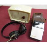 Dolci radio in white Bakelite type case W15cm D7.5cm H10cm with a set of Worko headphones and a