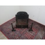 Cast Iron fire basket, with stepped arch back with relief fleur del lis decoration, and similar