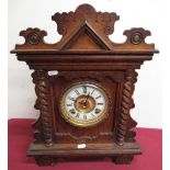 Early 20th C Ansonia "Newby" mantel clock, carved oak case with barley twist columns, two train