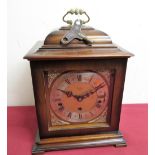 20th C Georgian style cased bracket clock with silvered chapter, three train triple chiming movement