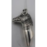 Silver whistle in the form of a Horse, on chain stamped Sterling