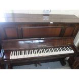 Upright mahogany piano by C Bechstein of Berlin retailed by Olderson & Brentnal Ltd of Newcastle