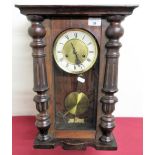 Early 20th C continental Vienna style wall clock carved glazed panel door enclosing brass and