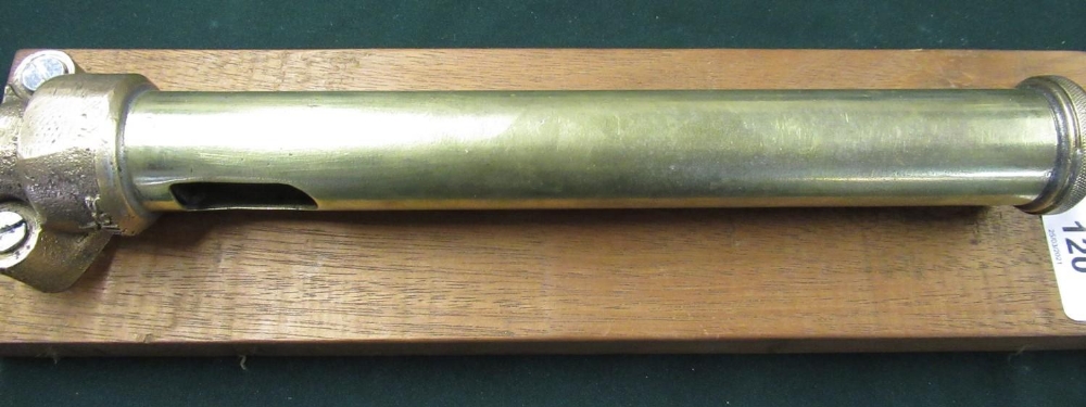 Brass steam locomotive whistle on wooden mount stamped 84055
