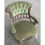 Victorian walnut framed low open armchair with deep buttoned cresting and galleried back, on