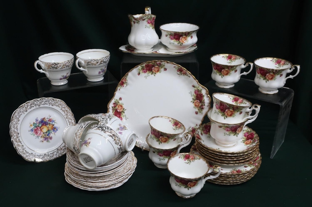 Royal Albert "Old Country Roses" part tea service and a part tea service with floral decoration