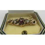 Victorian gold two stone diamond and ruby open work bar brooch, 3.5cm