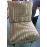 Victorian style nursing chair, back and seat cushion upholstered in contemporary stripe, on turned