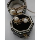 Pair of gold pearl earrings, stamped 9ct and a 9ct gold hallmarked pearl ring, size L (2)