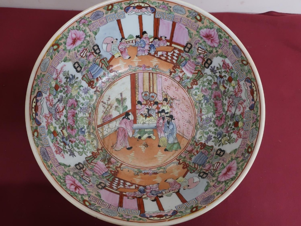 Large Japanese circular bowl, polychrome decorated in Famille enamels with panels of figures and