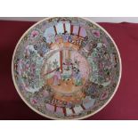 Large Japanese circular bowl, polychrome decorated in Famille enamels with panels of figures and