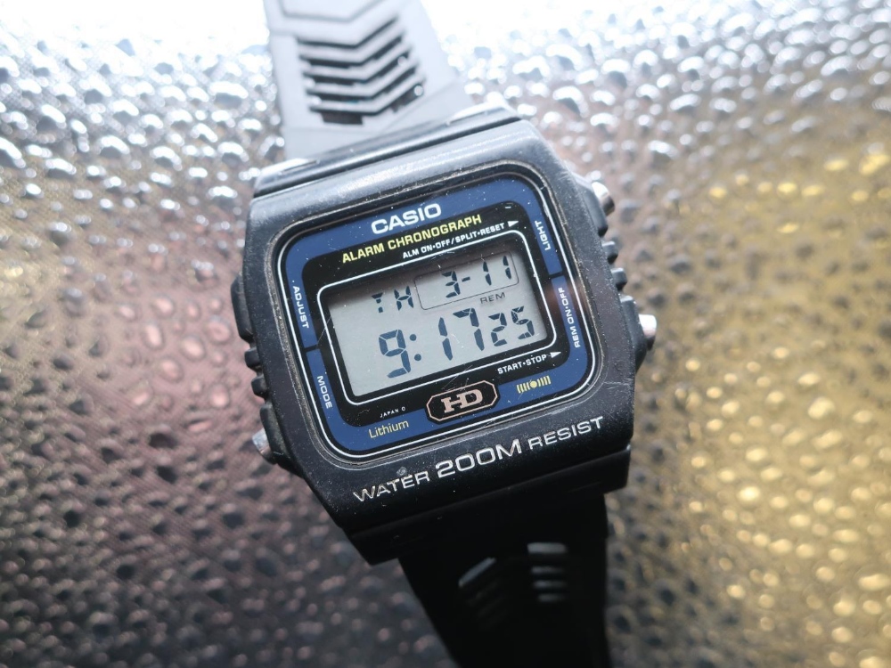 Casio LCD DW-240 200m alarm chronograph, synthetic case on rubber strap, stainless steel back