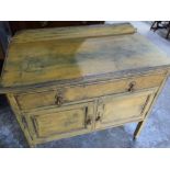 20th C oak side cabinet, with drawer above a pair of cupboard drawers, with vintage mustard paint