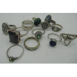 Collection of various silver and other rings in a variety of styles - stone set, signet, Celtic etc.