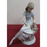 Lladro porcelain figure of a girl seated with a puppy and a parasol, No 7612, and two similar Lladro