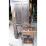 Early 20th C stained oak corner cupboard with two doors on stand, W92cm H190cm and an oak two tier