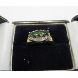 9ct gold hallmarked ring set with three green gemstones and diamonds, in a oval design, size N