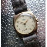 Avia mechanical wristwatch, 9ct gold cushion case with snap on back, stamped B.W.C London Made,
