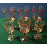 Suite of rose tinted glassware including stemmed wine glasses, sherry, liquors etc