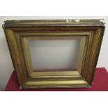Late 19th C gilt wood and gesso rectangular picture frame, the slip inscribed T.S. Cooper RA,