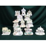 Collection of Coalport houses including "The Parasol House," "Thatched Cottage," "The Gatehouse," "
