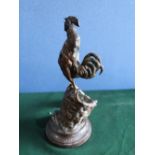 After Auguste Nicolas Cain (1822-1894), bronze spill holder modelled as a cockerel perched on a