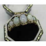 9ct gold hallmarked five stone opal ring, size O
