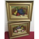 E Chester (Early 20th C): Pair of still life studies of fruit and flowers, oils on board, signed,