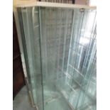 Three modern glazed display cabinets, each with three shelves, W43cm D37cm H162