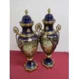 Pair of Serves style gilt metal mounted urn shaped vases and covers, bodies decorated with lovers in