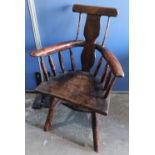 Country made rustic elbow chair with solid splat and yolk arms, on four out-splayed supports