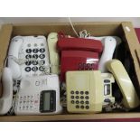 Two BT Big Button Plus landline telephones and other BT telephones