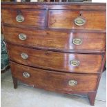 Geo.111 mahogany bow front chest of two short and three long drawers, with oval brass handles, on