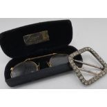 Georgian silver and paste square belt buckle and a pair of gold plated spectacles (2)