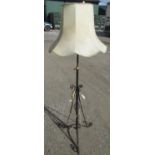 Black painted wrought metal adjustable standard lamp with shade, H170cm