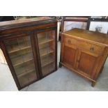 20th C oak side cabinet with drawer above two cupboards, W66cm D41cm H72cm, and a bookcase top