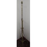 Early 20th C wrought metal adjustable standard lamp with gilt finish, H150cm