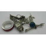Silver frog pendant, stamped sil. on rope chain, a scarf ring stamped 925, a butterfly wing and a