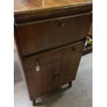 Nathan walnut cocktail cabinet with fall front, lifting top, and mirrored interior above a drawer