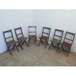 Set of six Venesta child's folding school chairs, with pierced laminate seats on square supports,