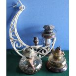 Brass oil lamp converted to electric, a Chalwyn Tropic Tilly type lamp, three oil lamps with glass