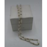 Single string seed pearl necklace, clasp stamped 375, L42cm