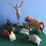 Carved wooden monkey, resin Buddha, three other Buddhas a carved soap stone Iguanas and a cast