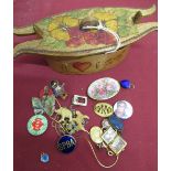 Two Edwardian gold plated oval lockets, rolled gold rose painted porcelain brooch, Golly guitar