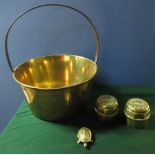 Pair of Forge Co., Kirkstall Leeds brass wagon wheel hubs, 19th C brass jam pan with steel strapwork